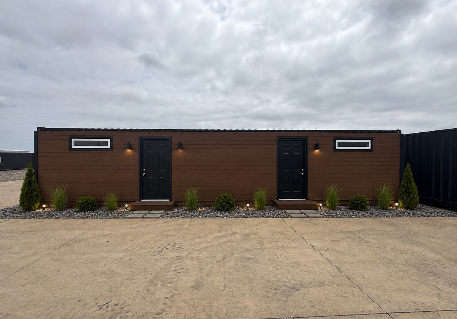 BOSS container duplex exterior — two private entrances